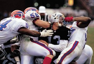 100 Greatest Photos - 038 - Carlton Bailey, Shane Conlan, Cornelius Bennett, Jay Schroeder